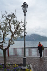 girl on the side of a lake
