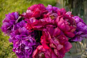 beautiful bouquet of bright flowers on a green background