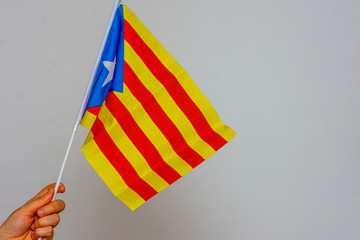 catalonia flag held on the white background