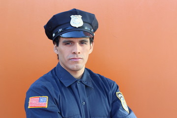 American cop in orange background 