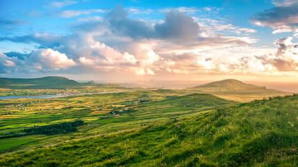 Beautiful view landscape seascape sunrise morning sunlight Valentia Island  Cromwell Point Lighthouse Portmagee Ring ok Kerry Ireland colors amazing splitting lights