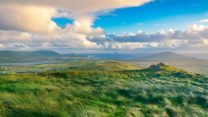 Beautiful view landscape seascape sunrise morning sunlight Valentia Island  Cromwell Point Lighthouse Portmagee Ring ok Kerry Ireland colors amazing splitting lights