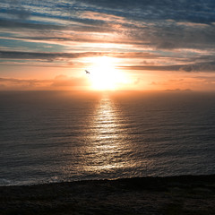 Beautiful view landscape seascape sunrise morning sunlight Valentia Island  Cromwell Point Lighthouse Portmagee Ring ok Kerry Ireland colors amazing splitting lights