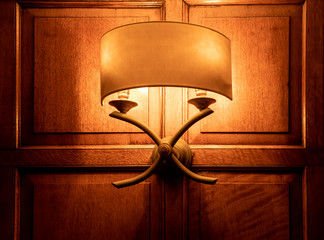 A traditional illuminated wall lamp