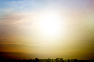 Bright orange sky and light of the sun.
