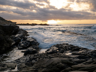  Rocky beach by the sea at dawn in Cabo de Huertas Alicante