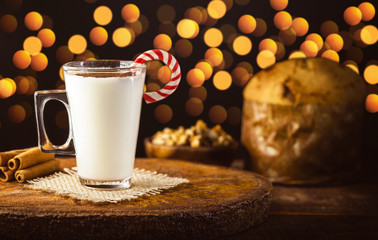 Eggnog. Typical Christmas drink with Christmas lights background. Bokeh effect in Christmas theme. Winter drink fifty.