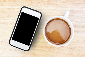 Smartphone and coffee on wooden table,People using smartphone to work and shopping online by internet and coffee for on table