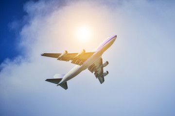 Airplane flying on blue sky