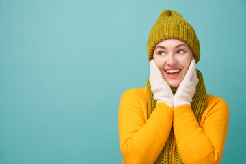Winter portrait of happy young woman