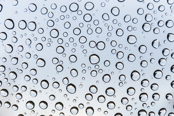 Water droplets on the glass during the rainy season. Copy space background and select focus