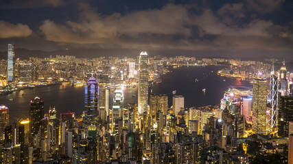 Fototapeta na wymiar night shot of victoria harbor from the peak in hong kong