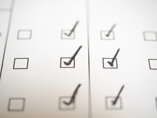 Black marking on checklist box,clos up.Checklist concept