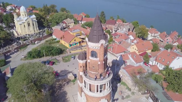 Descending opening aerial shot of Gardos Tower in Zemun Old city, Belgrade