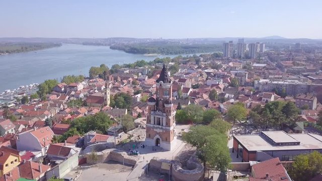 Establishing orbiting 4k aerial shot of Gardos Tower in Zemun Old city, Belgrade summer day