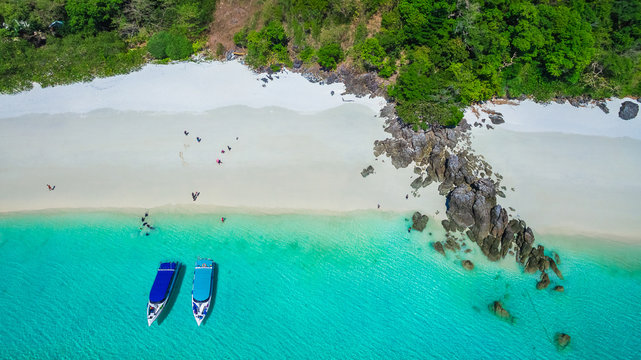 Aerial top view beautiful nature scenic vacation beach bright and clear blue sea with boat for traveler Ta Fook island, Destination place tourist travel Myanmar Thailand, Summer holiday tour Asia trip