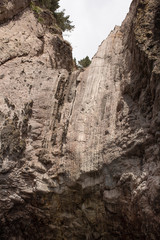 Cliffs and rock formations along the coastline of the Coromandel Peninsula
