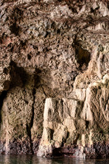 Cliffs and rock formations along the coastline of the Coromandel Peninsula