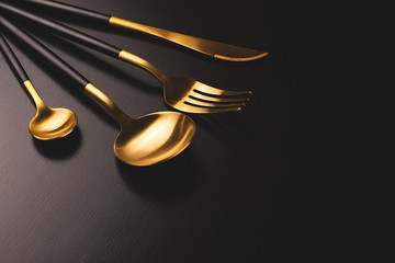 Dark creative shot of cutlery set.