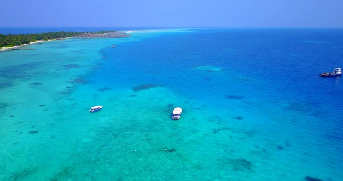 Boats Outside an Island in the Maldives
