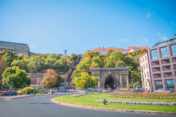 Fototapeta premium Budapest street in Hungary, tunnel and cable car with the Buda Castle in the background