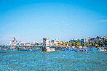 Famous Bridge on Danube river in Budapest city. Hungary. Urban landscape panorama with old building