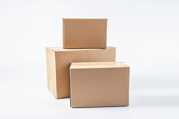 Bunch of blank courier box paper boxes on white background