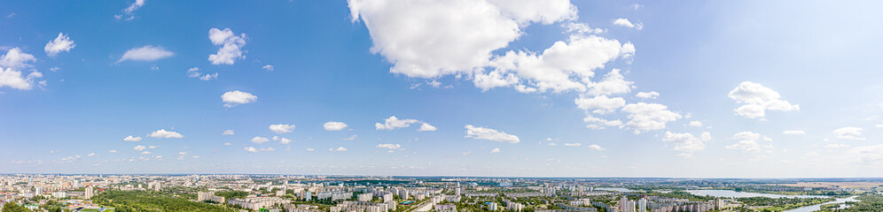 Fototapeta premium Aerial panoramic view, cityscape of Minsk. City residential area under blue sky in summer