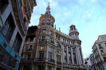 Fototapeta na wymiar Ornate Facade of typical residence/ commercial Buildings and streets in City of Madrid, Spain