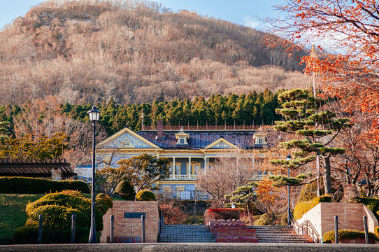 Old Hakodate Public Hall European style building in Motomachi with Mount Hakodate in background in autumn