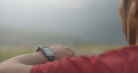 The man who watches the watch uses technology to help maintain the balance of his work.