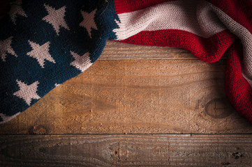 A United States of America flag scarf on wooden table