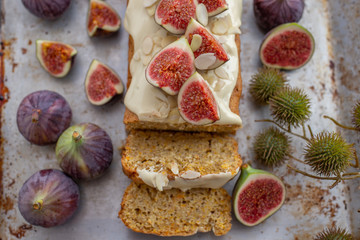 home made almond pumpkin pie with with chocolate frosting and figs