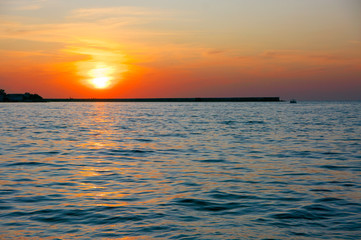 Obraz premium Sea shore landscape at sunset