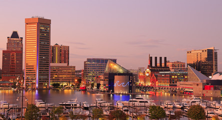 Colorful Baltimore skyline over the Inner Harbor at dusk, USA