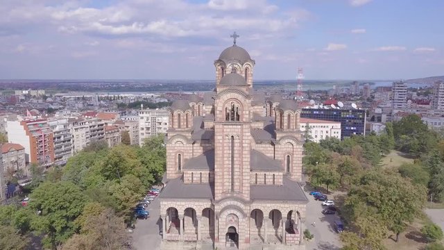 Fantastic aerial 4k establishing shot of St Mark Church monument in Belgrade