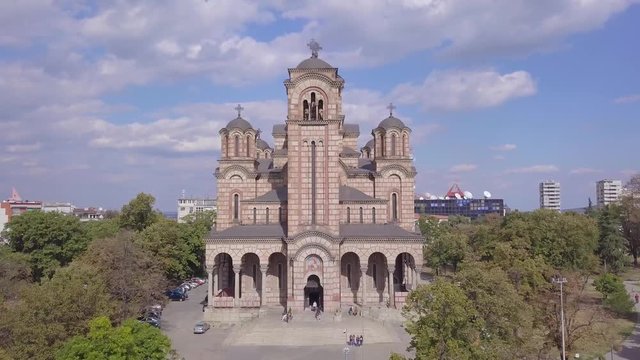 Breathtaking opening shot of St Mark Church in Belgrade, summer day Tasmajdan