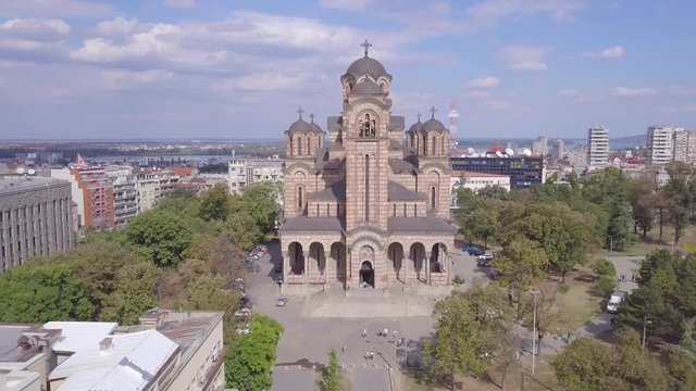 Incredible establishing aerial 4k shot of St Mark Church in City centre of Belgrade