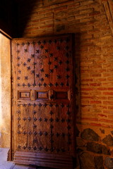 Old wooden door on the streets of the old city Madrid, Spain
