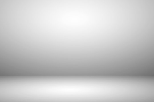Empty white studio room with light and shadow abstract background. Copy space studio room for present your products.