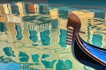 Venice gondola and reflection in Italy. © StockPhotoAstur