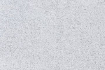 Rough white relief stucco wall texture background. blank for designers