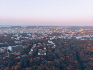 aerial view of autumn city park on sunset