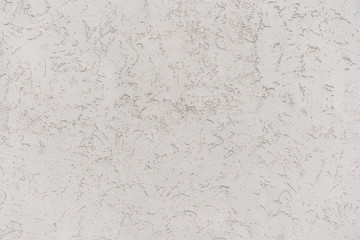 Rough white relief stucco wall texture background. blank for designers