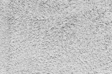 Obraz premium Rough white relief stucco wall texture background. blank for designers