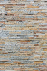 Natural facade stone decoration quartzite background texture. modern granite stone wall