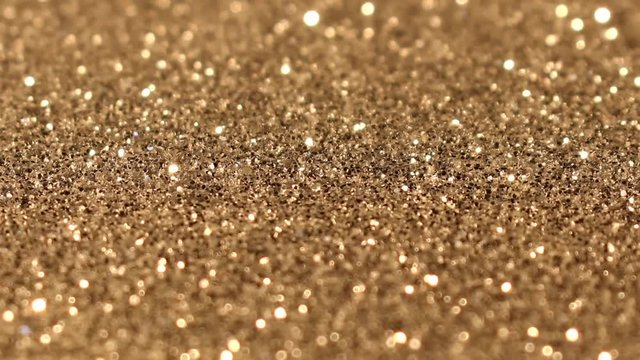 beautiful festive shiny video with shimmering gold sequins 