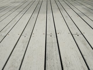 wooden floor and white wall.
