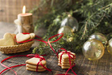 Cookies with baubles on table