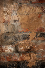 Vintage uneven brick wall texture is close